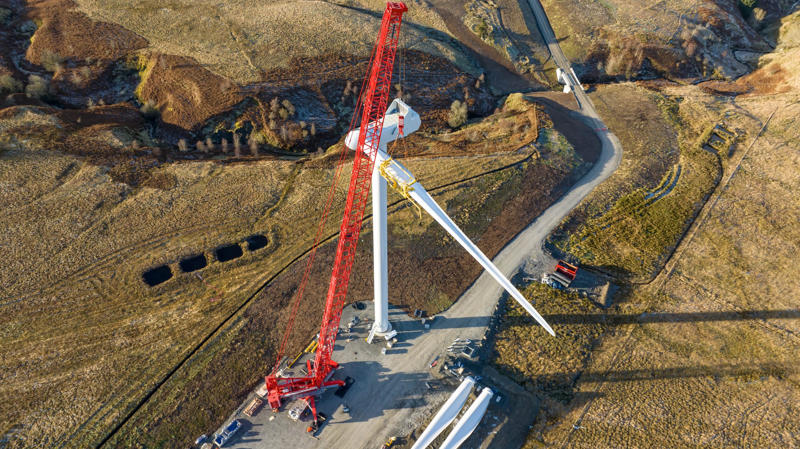 Aerial view of AIS Wind Energy turbine installation at Sandy Knowe Wind Farm